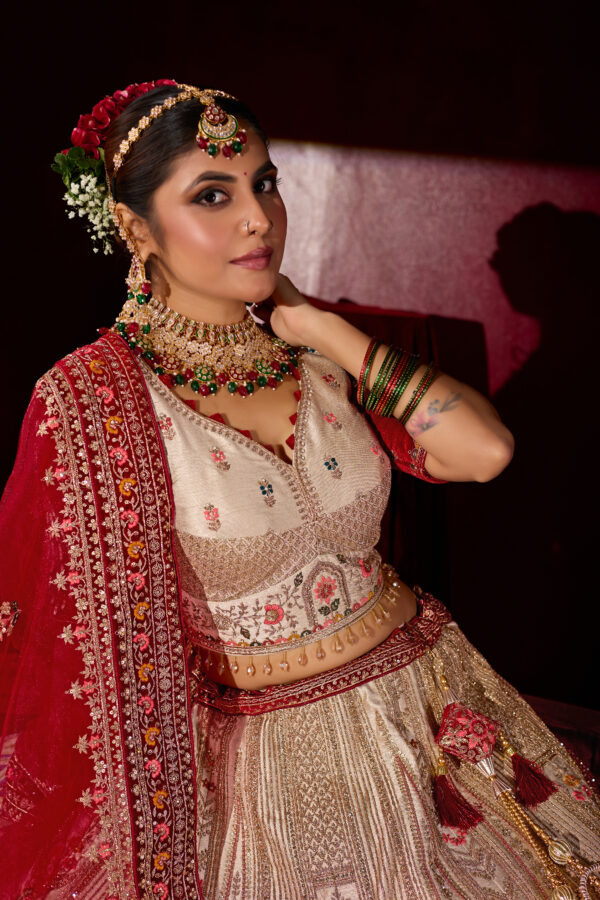 Off-White Heavy Embroidered Silk Bridal Lehenga with Red Dupatta - Image 2