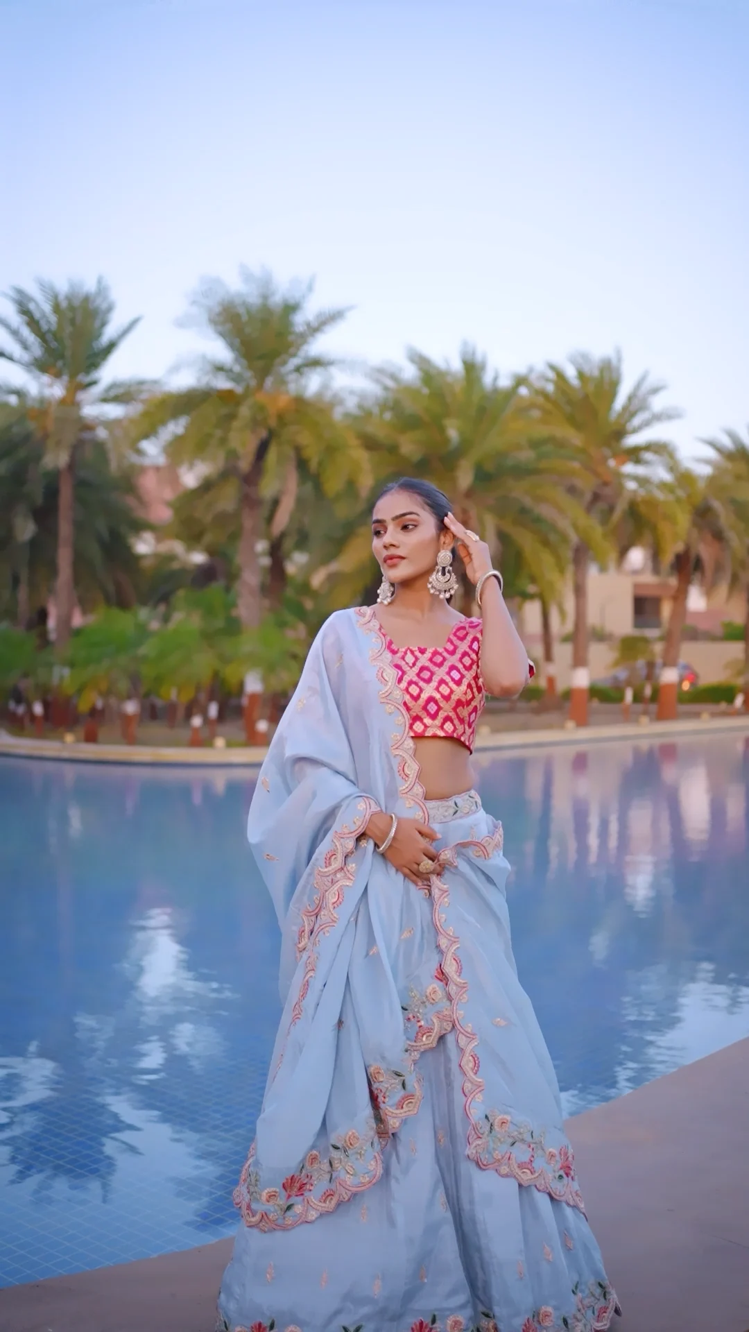 Sky Blue viscose lehenga with hot pink embrodeiry worked blouse